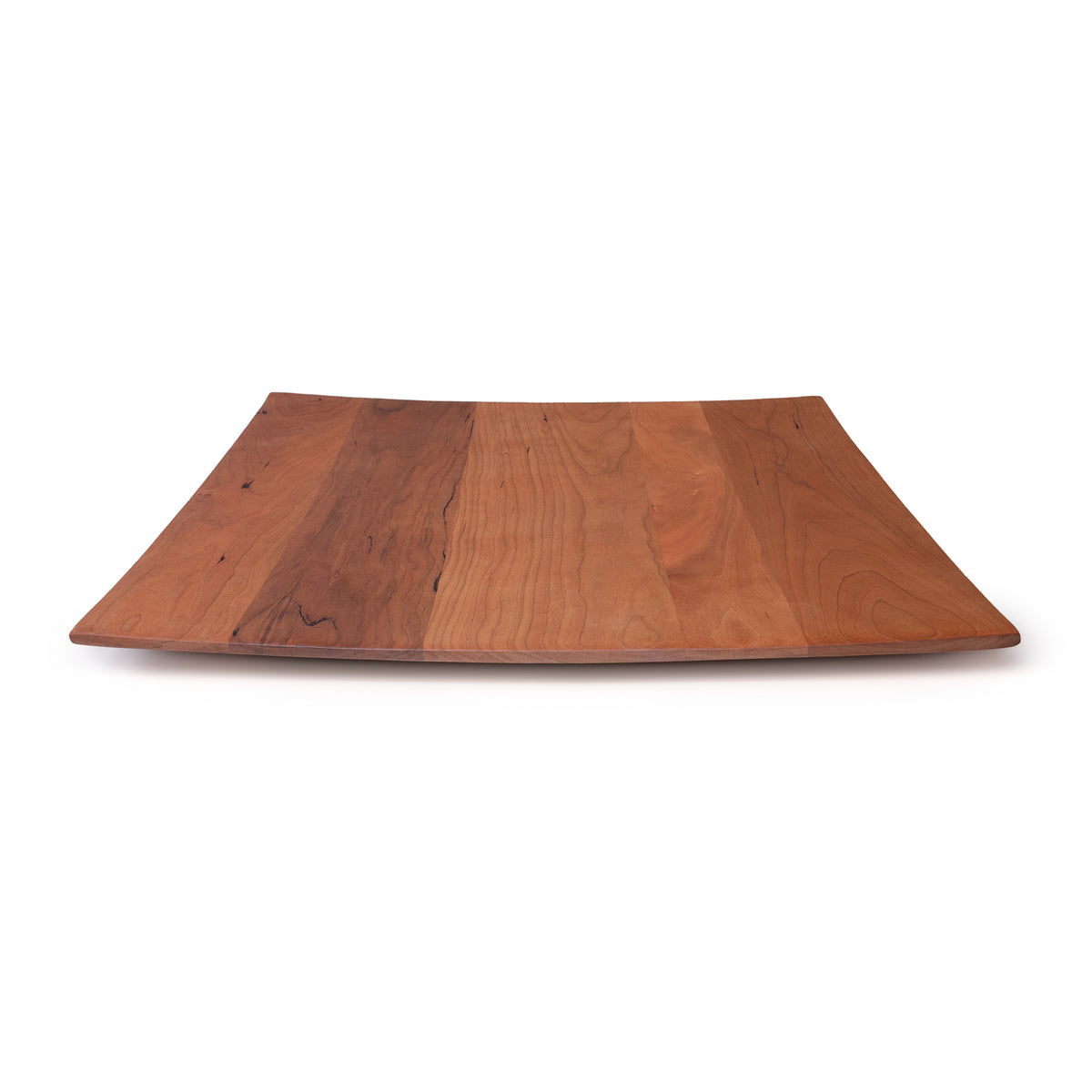 Square cherry wood serving platter with curved edges and natural grain visible throughout.