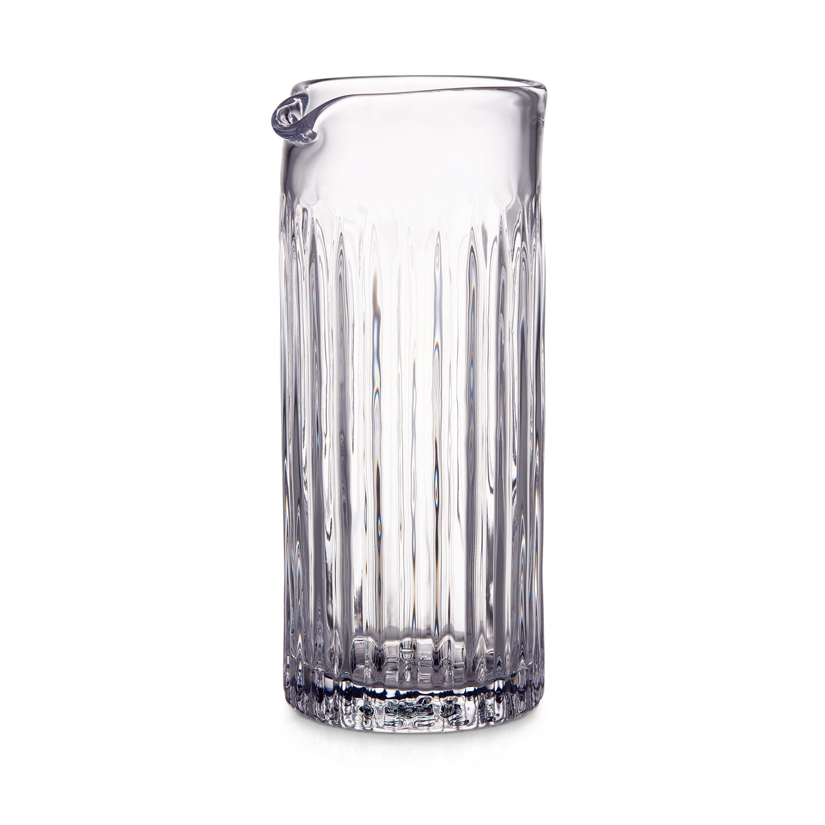 Clear glass pitcher with vertical ribbed pattern and curved handle spout.