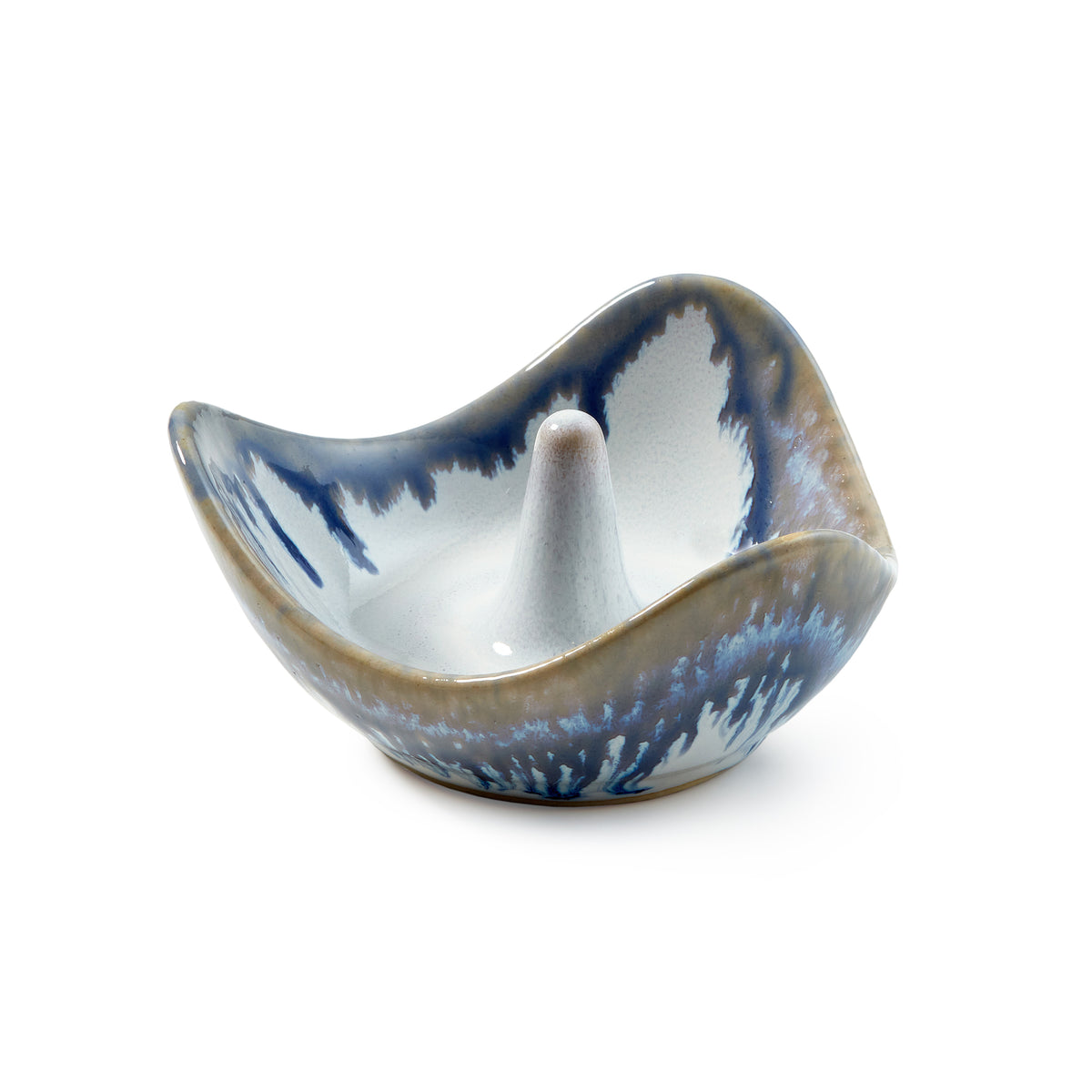 Ceramic ring holder with blue and white glazed finish and central cone post.