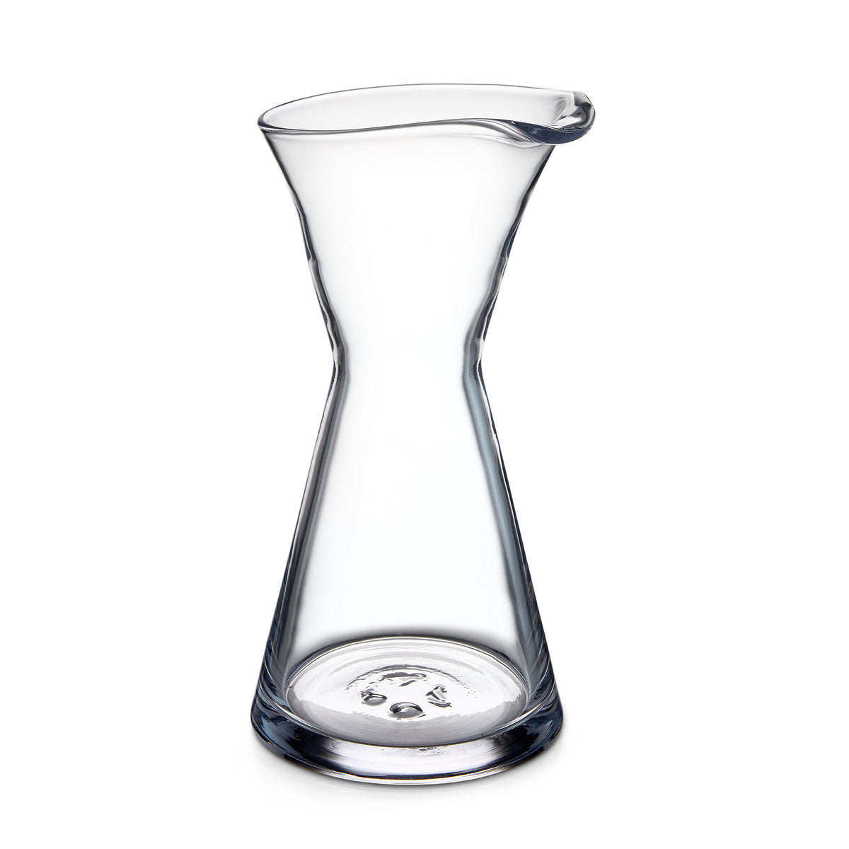 Clear glass pitcher with hourglass shape and pouring spout.