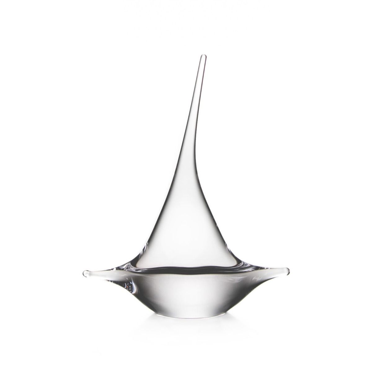 Clear glass sailboat-shaped decorative object with pointed top and wide base on white background.